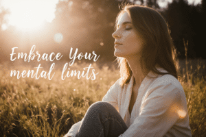 Woman sitting peacefully at sunset embracing her mental limits